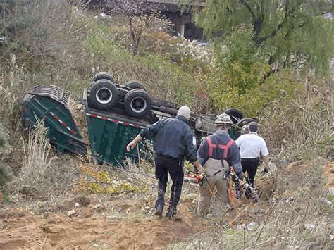 Garbage Truck Accident in White Western Star Down 30ft Embankment ...