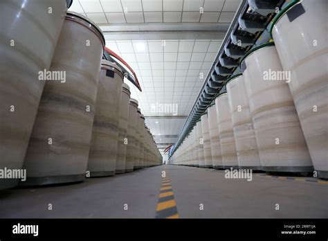 Machinery and equipment of spinning mill Stock Photo - Alamy