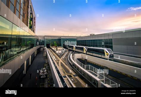 Skytrain departing from Terminal 3 in Changi Airport, Singapore Stock Photo - Alamy