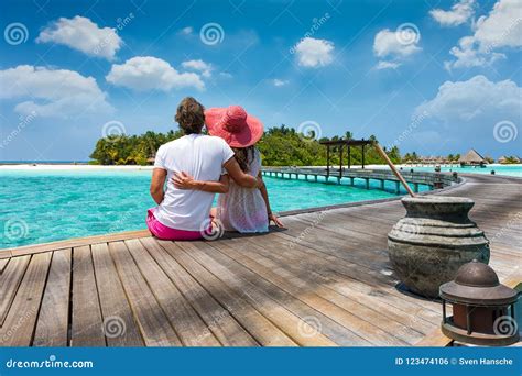 Honeymoon Traveller Couple in the Maldives Islands Stock Photo - Image of clear, hand: 123474106