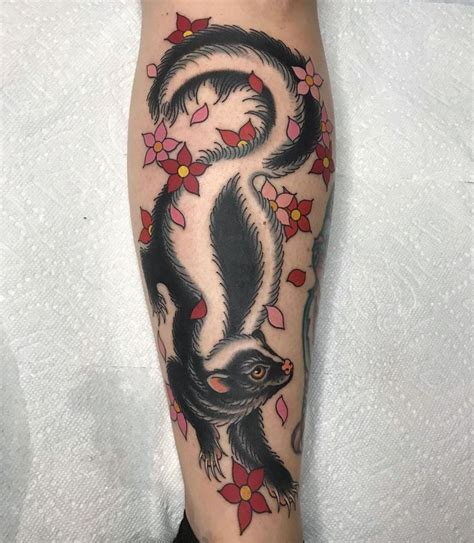 Serpent & the Rainbow Tattoo on Instagram: “Skunk by @deandenney” in 2021 | Rainbow tattoos ...