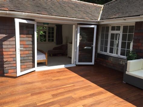 A completed decking installation using IPE decking tiles - Wallbarn