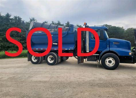 2008 VOLVO VHD TANDEM AXLE DUMP TRUCK WITH SNOW PLOW AND SANDER - SOLD ...