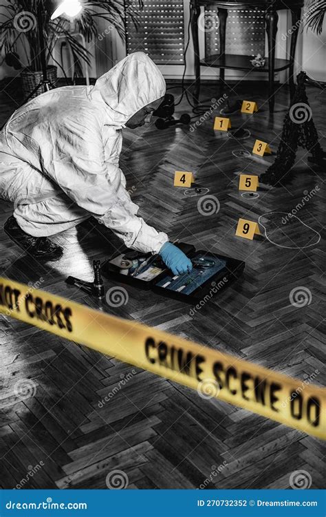 Forensic Science. Police Investigator Collecting Clues Stock Photo ...