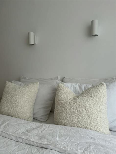 Bed with Pillows in White Faux Fur Covers · Free Stock Photo