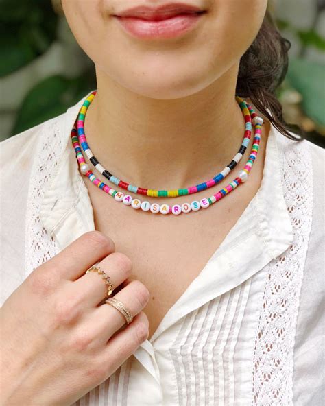 DIY Color Blocked Disk Beaded Necklaces | the neon tea party In this DIY tutorial, learn how to ...