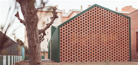 Perforated Brick Facades Make a Home More Stylish and Energy Efficient