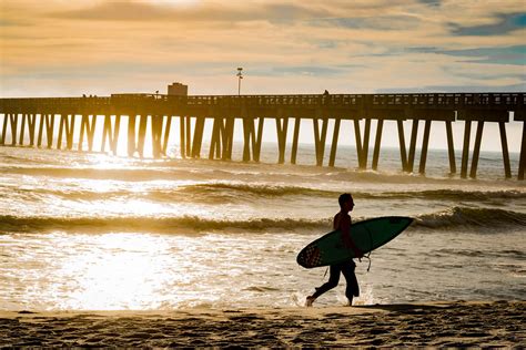 Golden Surf Sunset | Life's a beach for this surfer. After h… | Flickr