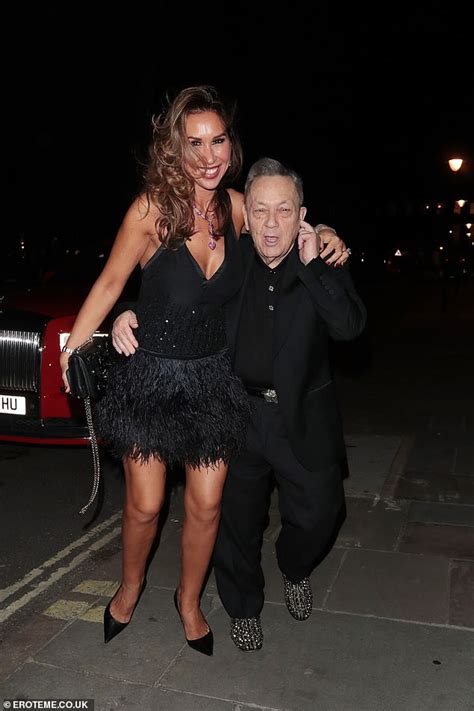 RHOC's Ampika Pickston, 41, towers over her billionaire West Ham chairman fiancé David Sullivan ...