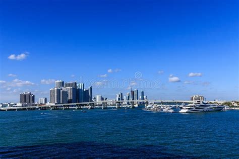 Yachts at Biscayne Bay Bridge Stock Photo - Image of holiday, boat ...