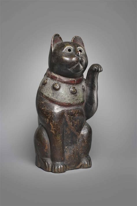 What is the story of maneki-neko, the Japanese beckoning cat? - EconoTimes