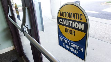 Automatic door caution signage. At Pensacola Sign, we can make any type ...