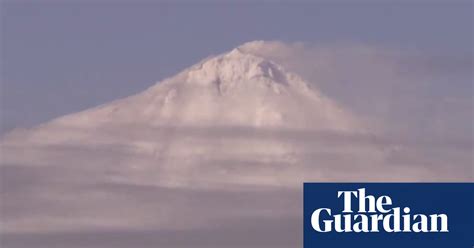 Research vessel in Antarctica captures rare footage of volcano erupting ...