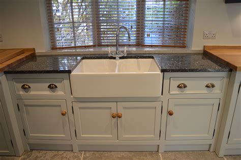 Belfast sink unit with granite drainer fits nicely between base units with oak worktops | Free ...