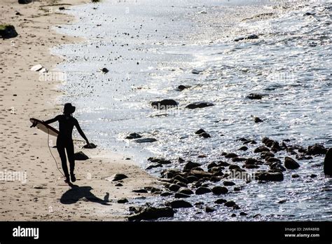 Surfing at sunset Beach in Pacific Palisades, California, USA Stock ...