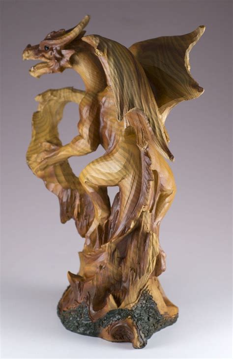 Dragon figurine/statue with wood look. The painted finish mimics wood ...