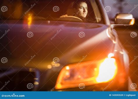 Handsome Young Man Driving His Car at Night Stock Image - Image of corporate, indoor: 143593539