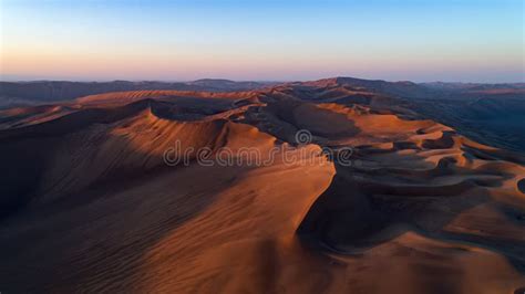 Sunrise in the Lut desert stock photo. Image of morning - 167491602