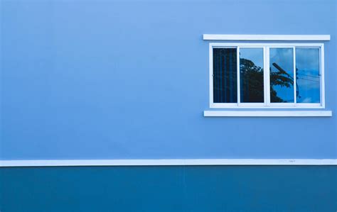 blue window with white shutters 11098765 Stock Photo at Vecteezy