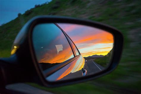 Colorful Sunset Sky In A Rear-view Mirror At Night Photograph by Cavan Images - Fine Art America