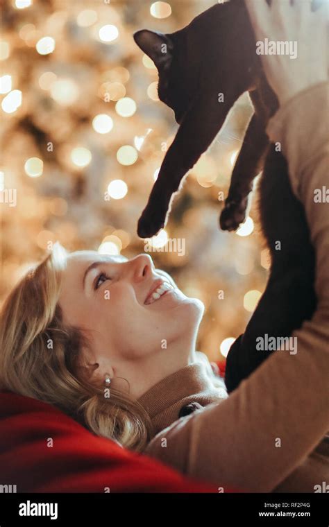 Cat owner. Woman with her pet Stock Photo - Alamy