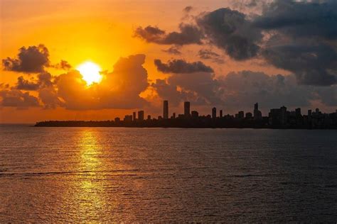 Thousands Flock To Marine Drive On To Catch A Typical Mumbai Sunset