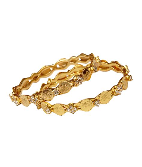 Gold bangles with stones