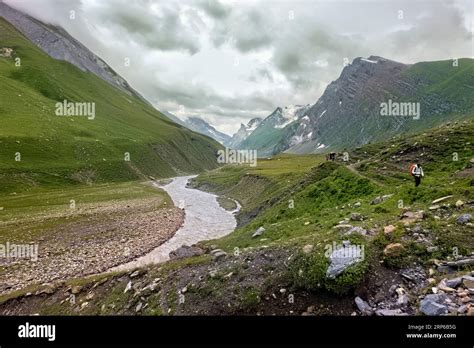 Trekking through the beautiful lush Warwan Valley, Pir Panjal Range, Kashmir, India Stock Photo ...