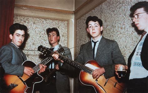 BEATLES EARLY PHOTOGRAPH BY MIKE McCARTNEY A color photograph of Paul McCartney, George Harrison