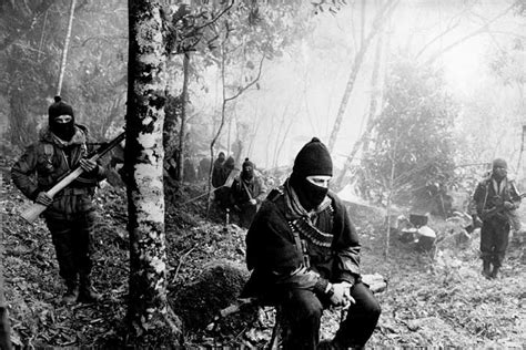 The Zapatista Uprising in Mexico Zapatista insurgents in ChiapasLos ...