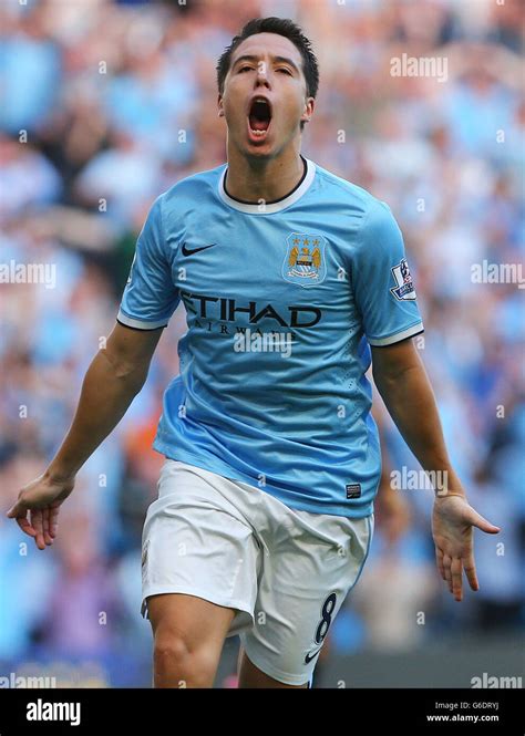 Manchester City's Samir Nasri celebrates scoring their fourth goal during the Barclays Premier ...