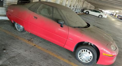 This GM EV1 Escaped The Crusher Only To Rot In An Atlanta Parking Garage | Carscoops