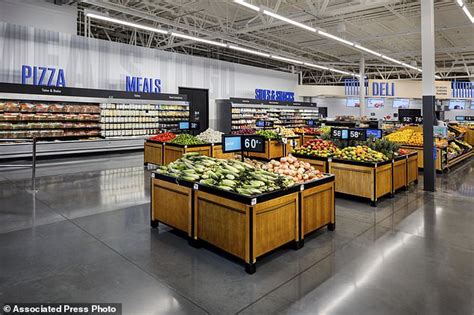 Walmart rolls out app-friendly store redesign inspired by airports with digital aisle navigation ...