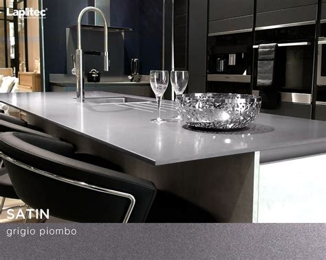 Modern lines with luster. This kitchen uses Lapitec® Satin in Grigio Piombo for a durable and ...