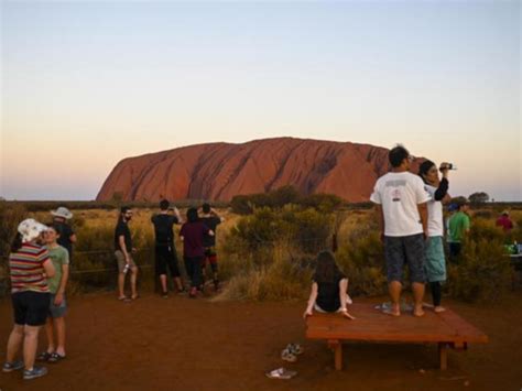 Tourists race to Uluru as climbing ban looms | 7NEWS