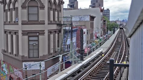 Subway Train Pulls Into Elevated Platform In The Bronx, New York City ...