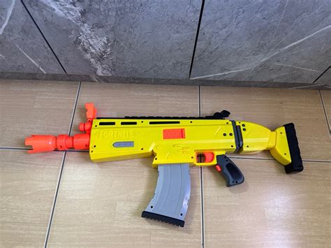 Fortnite AR-L Nerf Elite Dart Blaster - Motorized Toy Blaster, 20 Official Nerf Fortnite Elite ...