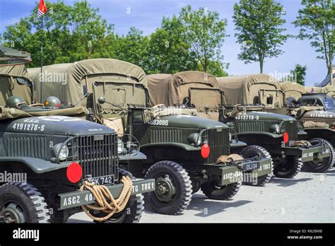 American World War Two GMC CCKW 6x6 US Army cargo trucks, military vehicle also known as Jimmy ...