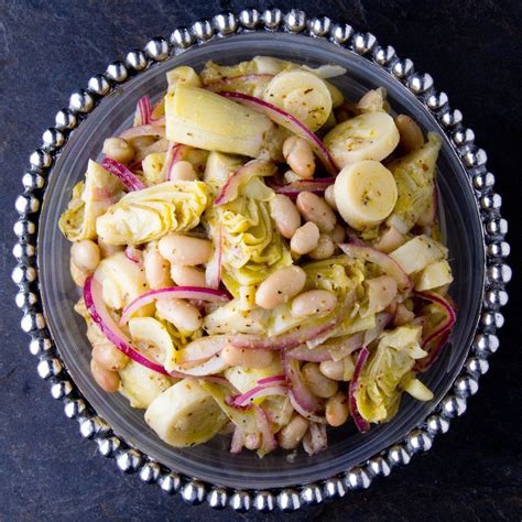 Zesty Artichoke and Palm Salad with Cannellini | Marinated salad, Artichoke heart recipes ...