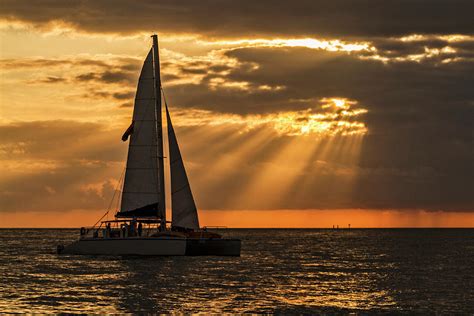 Catamaran Sunset Cruise in Key West Photograph by Bob Slitzan - Fine ...