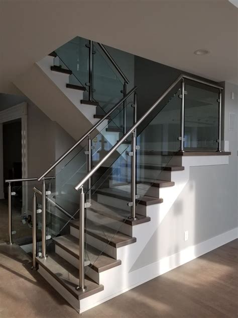 Sleek and Stylish Metal and Glass Railings