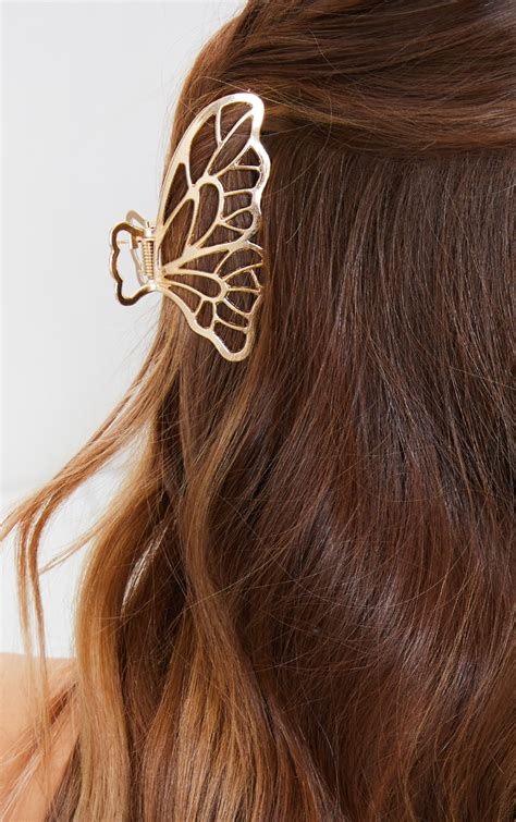 Gold Butterfly Hair Clip | Accessories | PrettyLittleThing USA