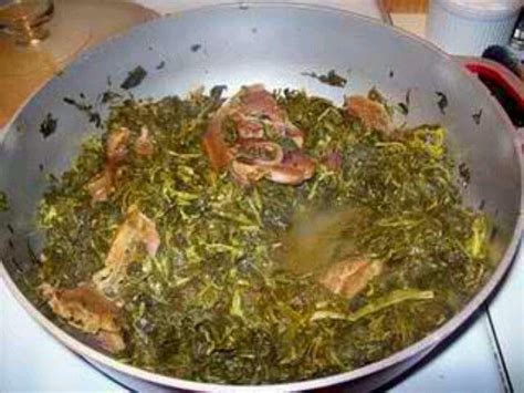 Turnip greens & ham hocks..in the South its against the law to have greens without cornbread :P ...