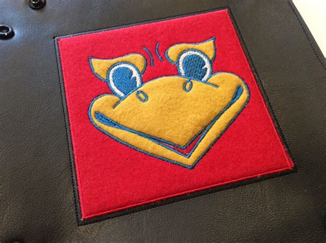 Embroidered Jayhawk face freebie | Silver Seams