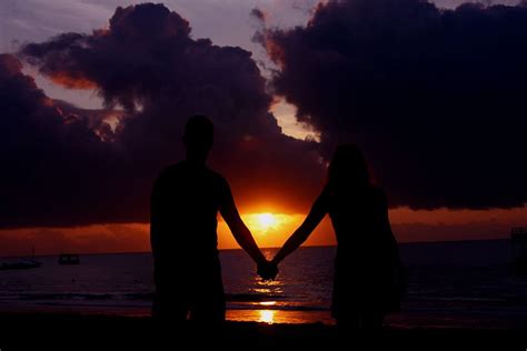 HD wallpaper: silhouette, two people, holding hands, sunset, beach ...