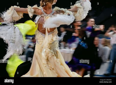 competition ballroom dancing rear view women dancer in cream dress, viennese waltz dance Stock ...