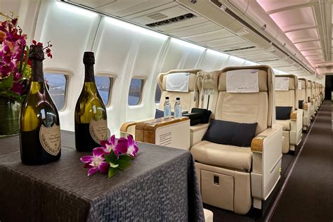 An exclusive look inside the $160,000-a-seat private Boeing 757 charter, with just 48 first ...