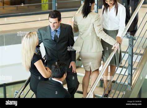 group of busy office workers walking on stairs Stock Photo - Alamy