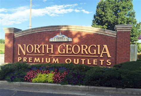 Some luxury designers now open at the outlet mall, more on the way - Forsyth News