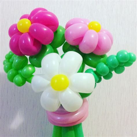 Vase filled with Balloons and Flowers